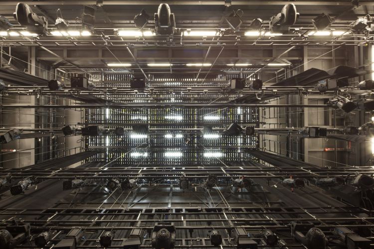 Looking up into the automation and lighting of the Milton Court Theatre